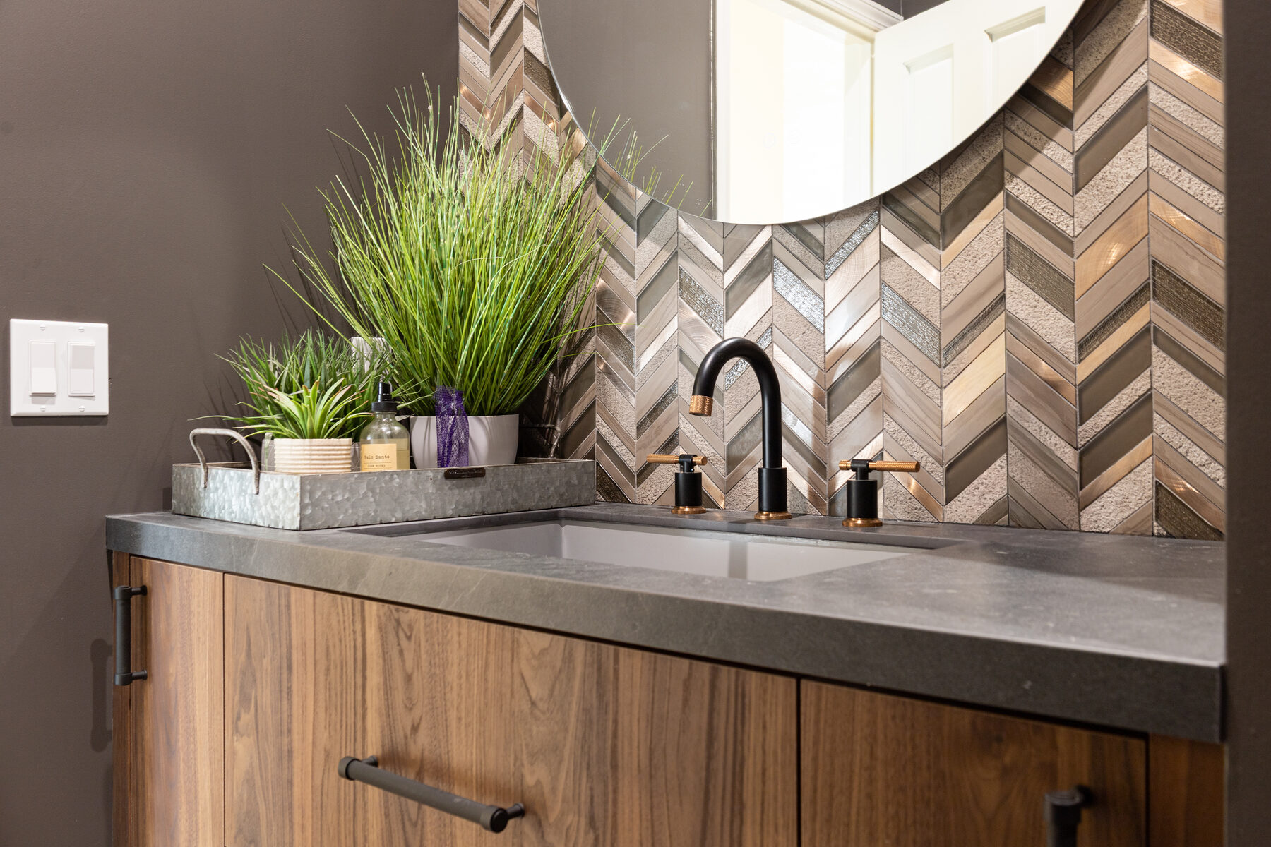 Powder bath wide view with chevron tile
