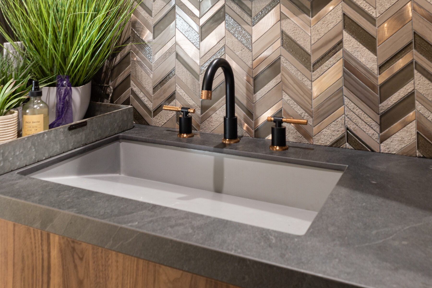 Sink and brass faucet detail
